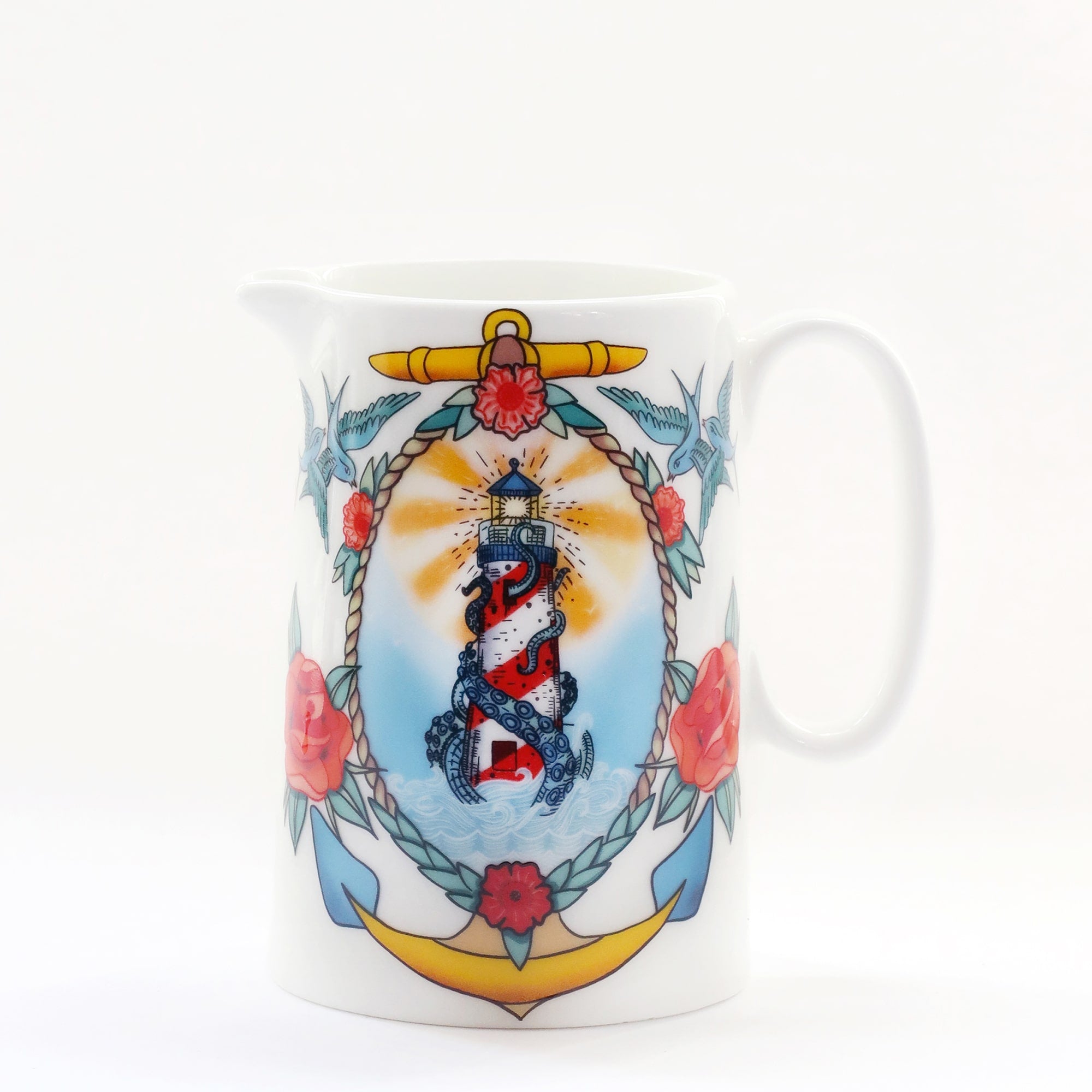 Product shot of a white jug with a lighthouse, kraken and roses design that is inspired by sailor's tattoos.
