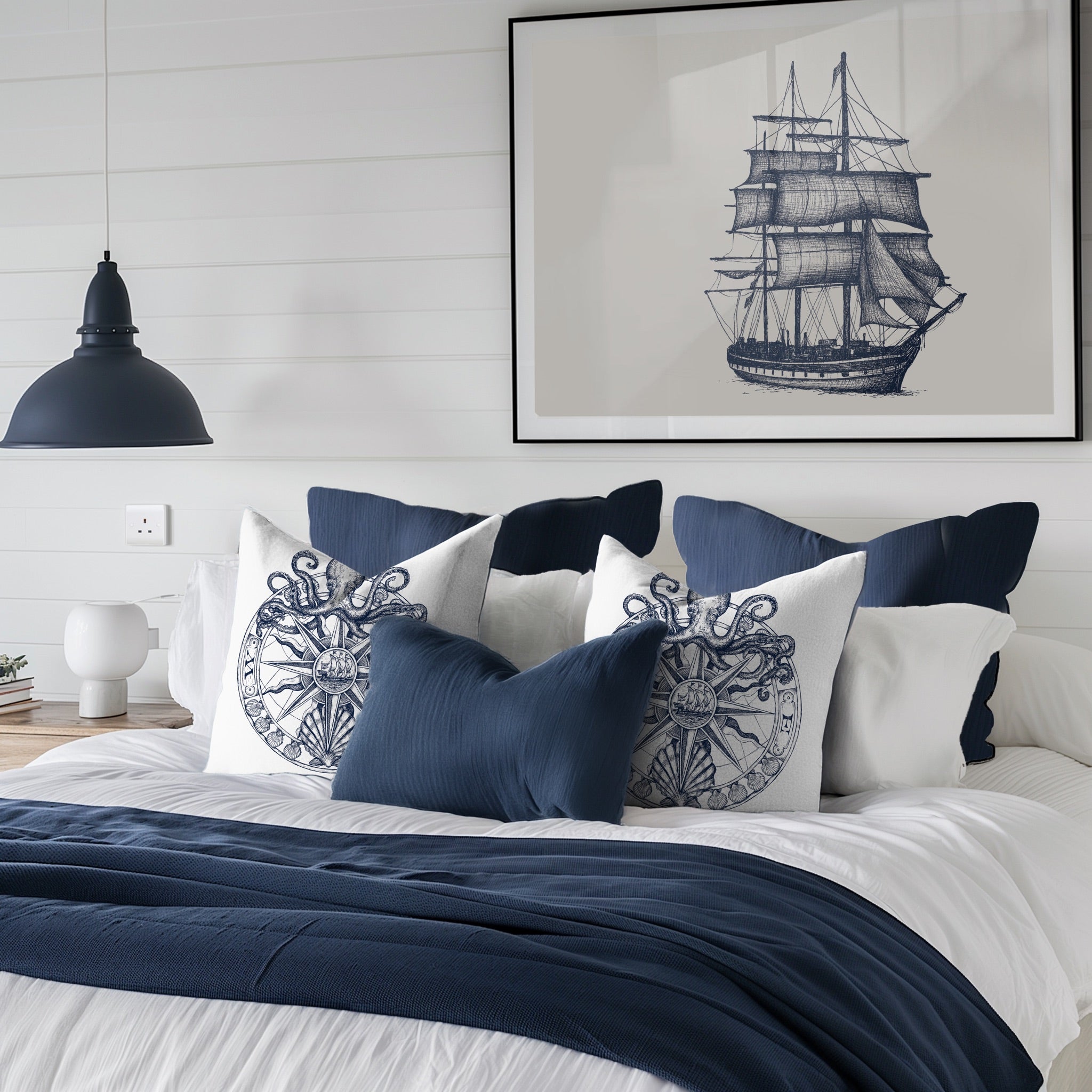 Classic Blue & White Maritime Collection on a luxurious bed with coastal nautical theme
