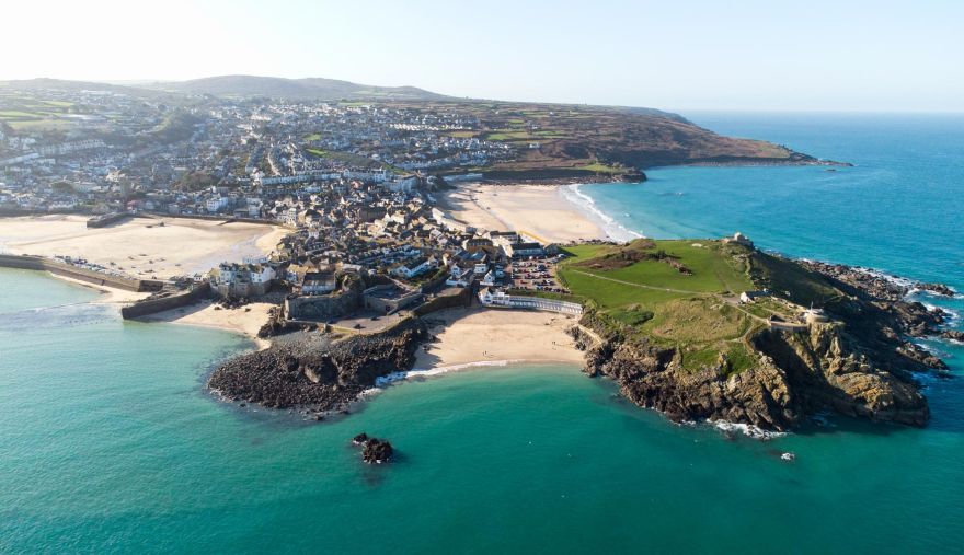A beautiful panoramic image of St Ives headland and beaches