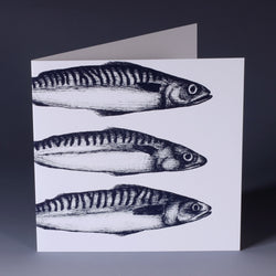 greeting card with navy illustration of 3 mackerel without tails on a white background