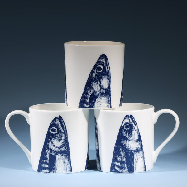 Bone china white mug featuring hand drawn Mackerel Heads design in classic navy in a stack of three