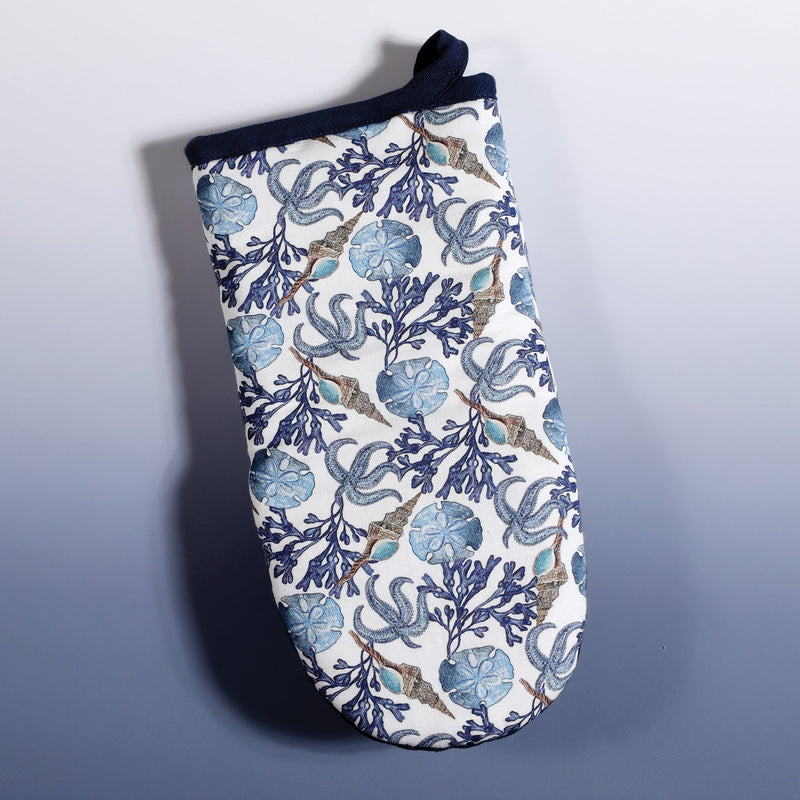Cotton and Linen mix oven mitt with hand drawn mini illustrations of Starfish,Sand dollar,seaweed and a whelk shell in shades of blue  with a navy trim