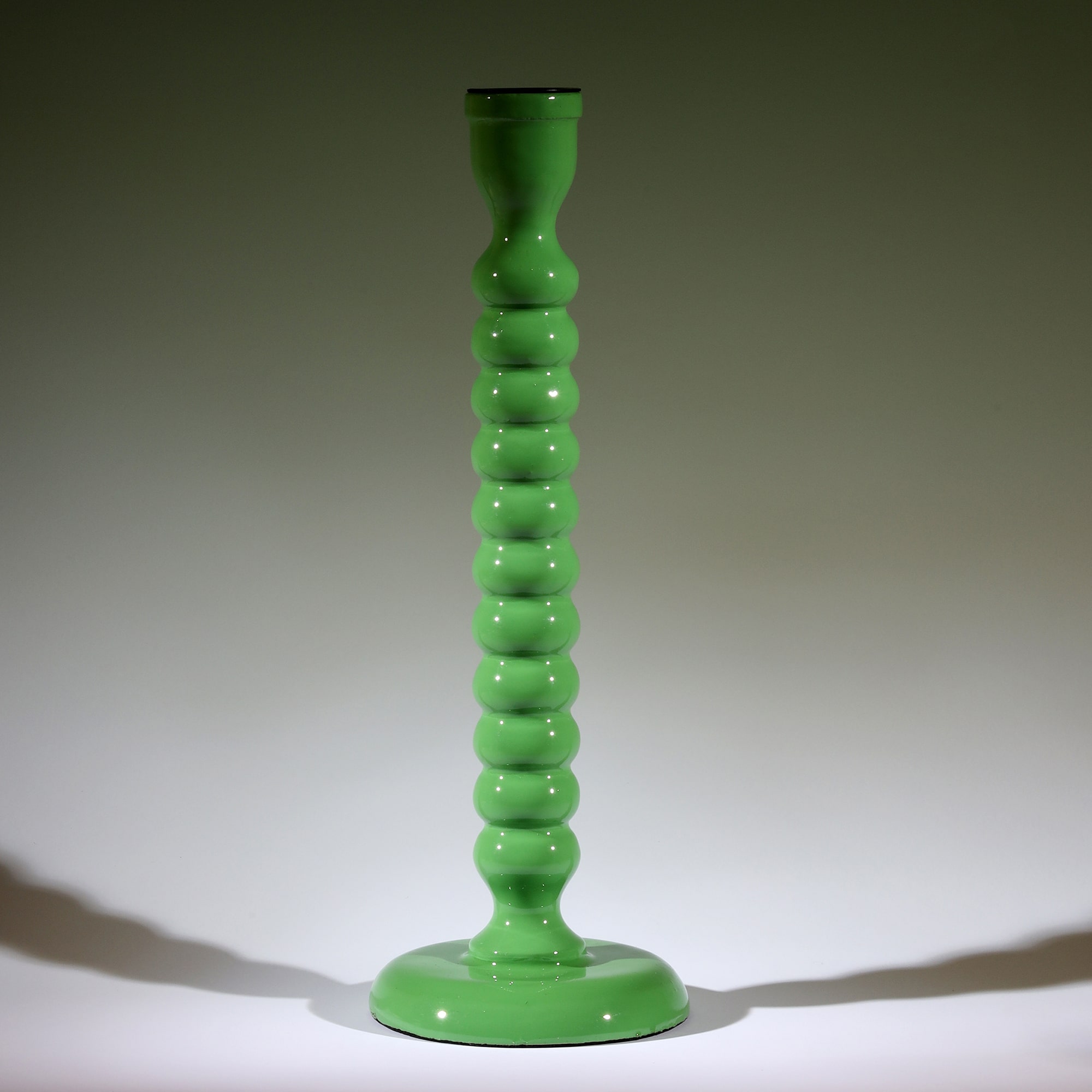 Bud Green Polished Lacquer Candle holder,it is twisted all the way down like a corkscrew tapered at the bottom.