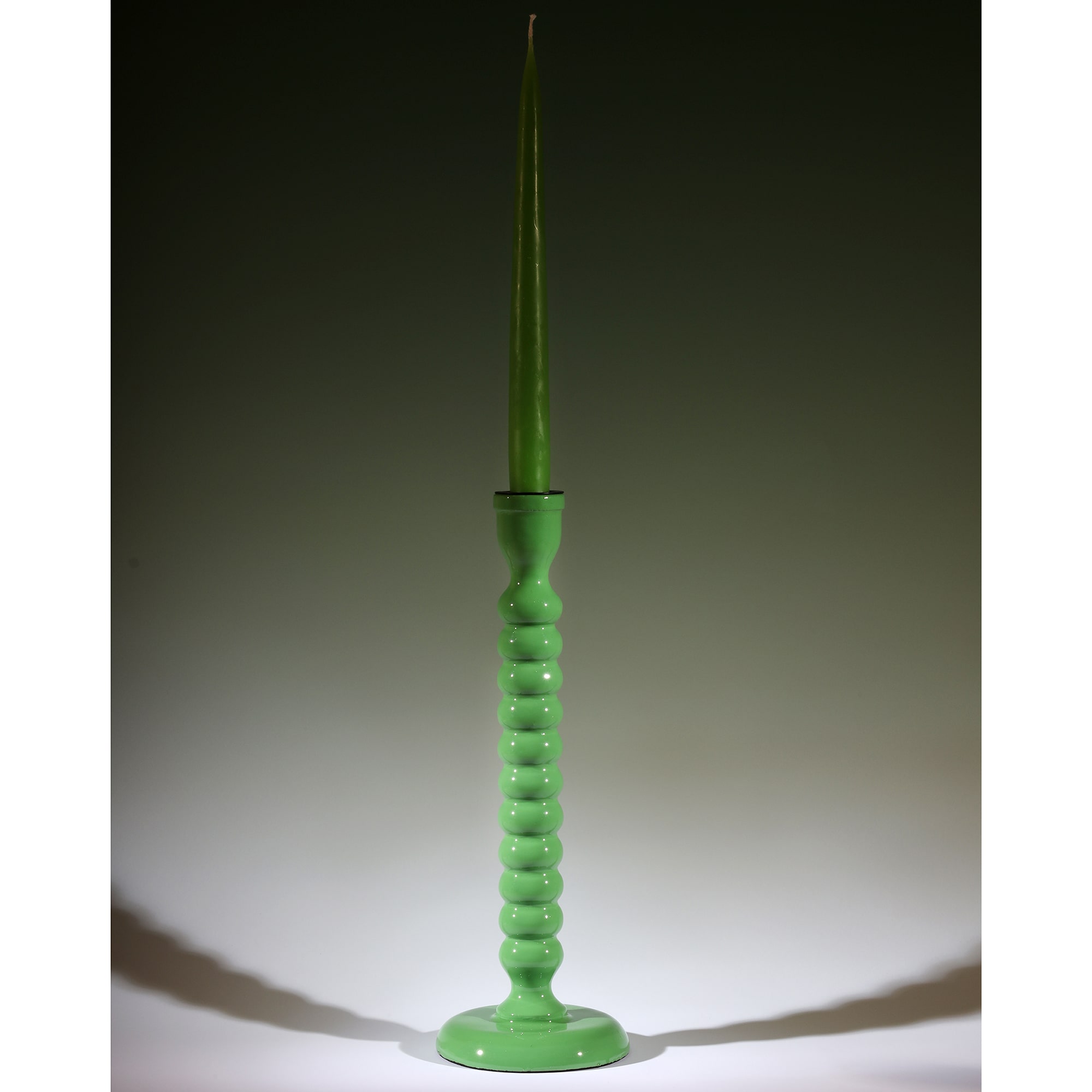 Bud Green Polished Lacquer Drift Candle holder with a matching candle