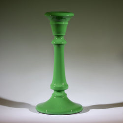 Bud Green Polished Lacquer Candle holder,tapered at the top,moving down it has various section and a long smooth piece to finish with a tapered base