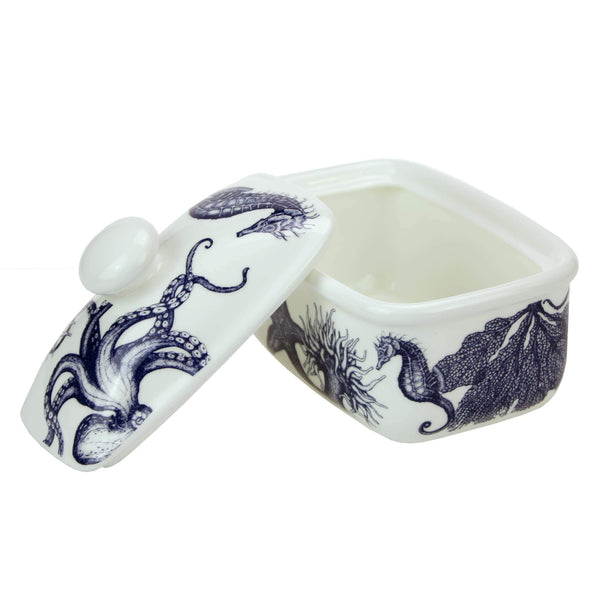 Butter dish in our Classic range,with seahorses,shells,octopus and other sea themed designs all over the base and the matching lid is placed on one side
