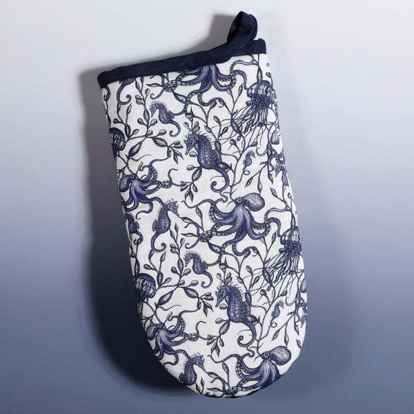 Cotton and Linen mix oven mitt with hand drawn mini illustrations of Seahorses,Octopus and seaweed in navy with  navy trim