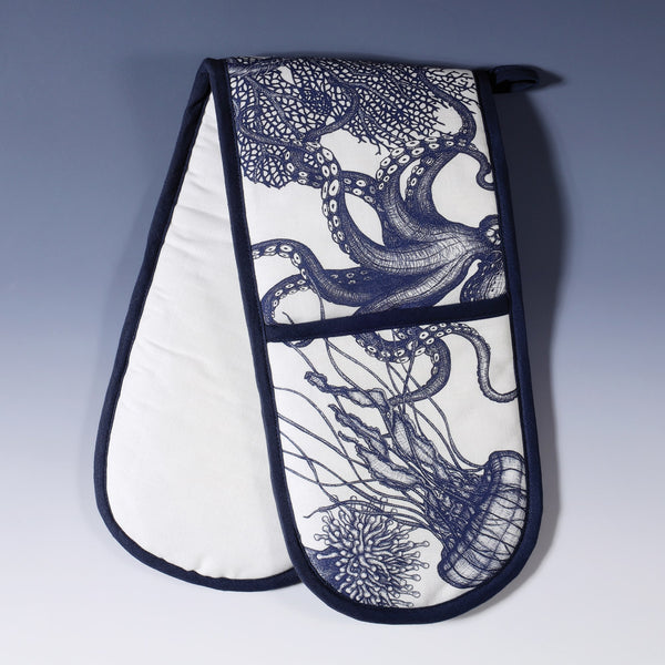 Cotton and linen mix oven gloves with hand drawn illustrations of our classic print of Jellyfish,seahorses,anemones and Octopus design on white with Navy contrasting finish