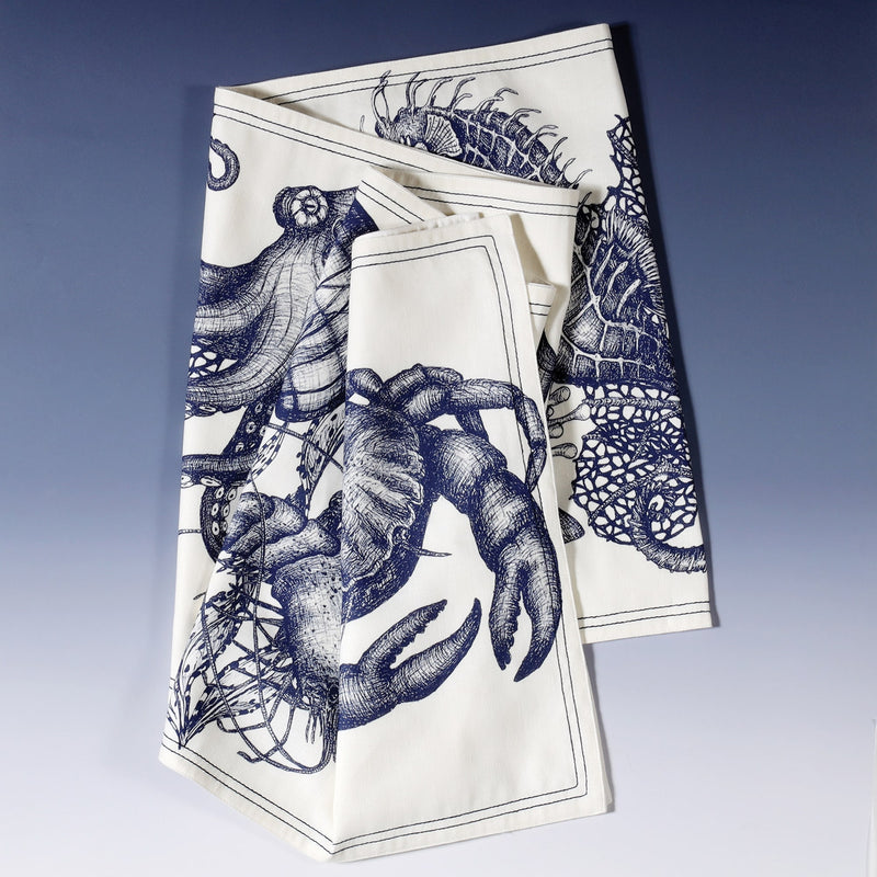 Cotton and Linen mix table runner with hand drawn illustrations of Navy Octopus,Crab,Seahorse and others from our classic sea creatures in Navy on white