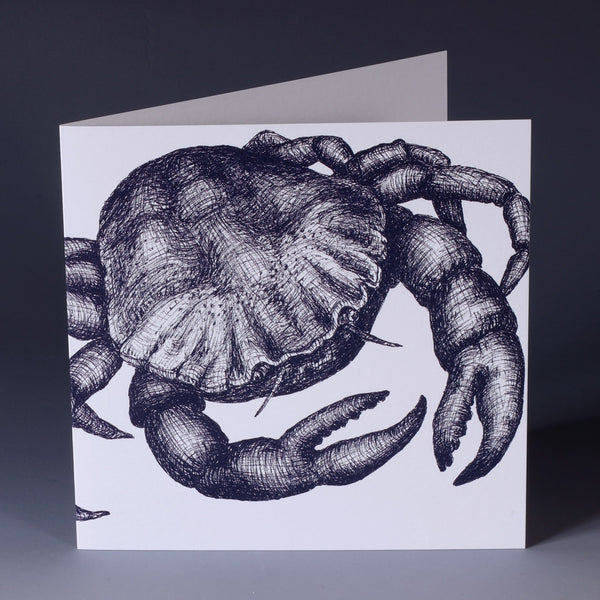 greeting card with navy illustrated crab on a white background