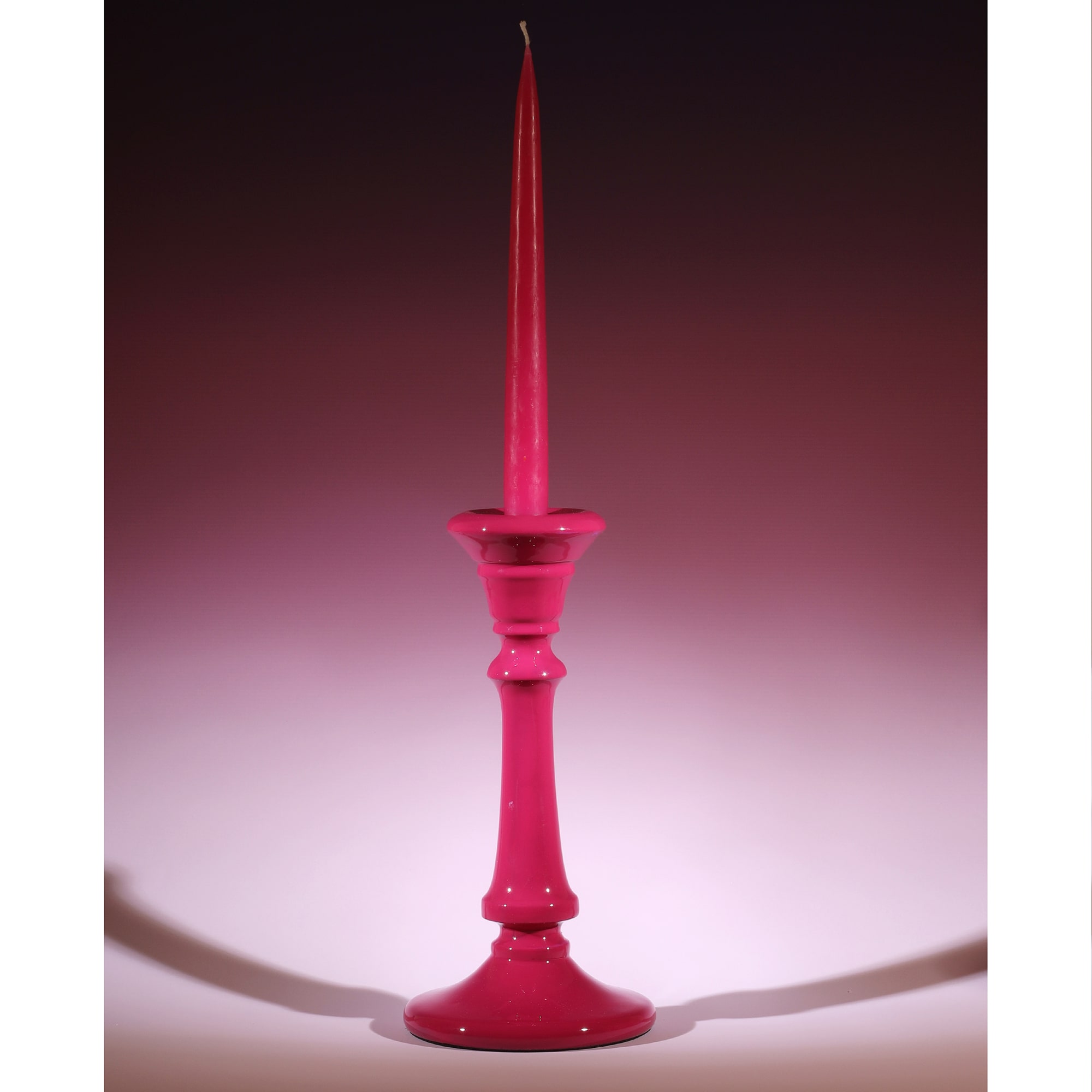 Fuschia Polished Lacquer Tidal Candle holder with a matching candle