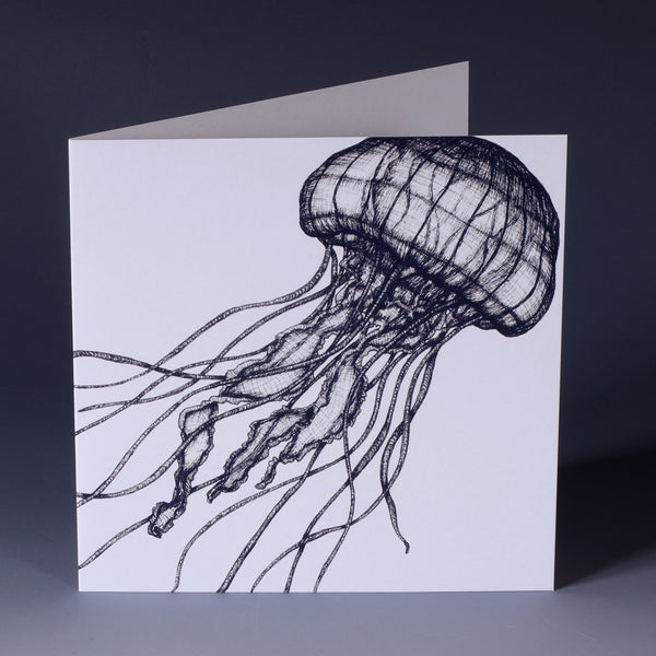 greeting card with illustrated navy jellyfish which looks like it's dancing on a white background