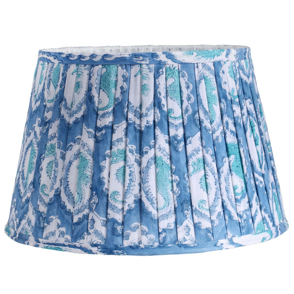 Medium Seahorse Cameo pleated lampshade in hand blocked print in blue and white ,fabric finished edges and lined in white