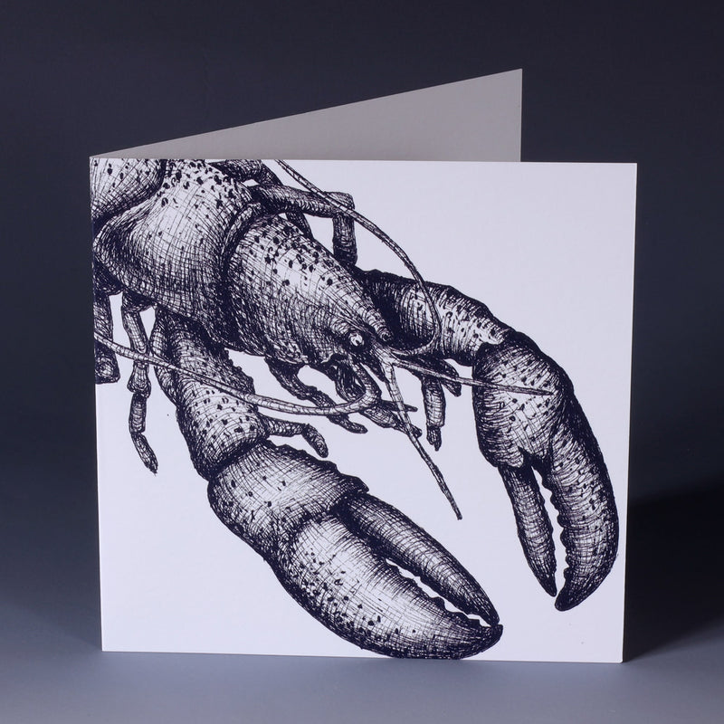 greeting card with navy illustrated lobster on white background