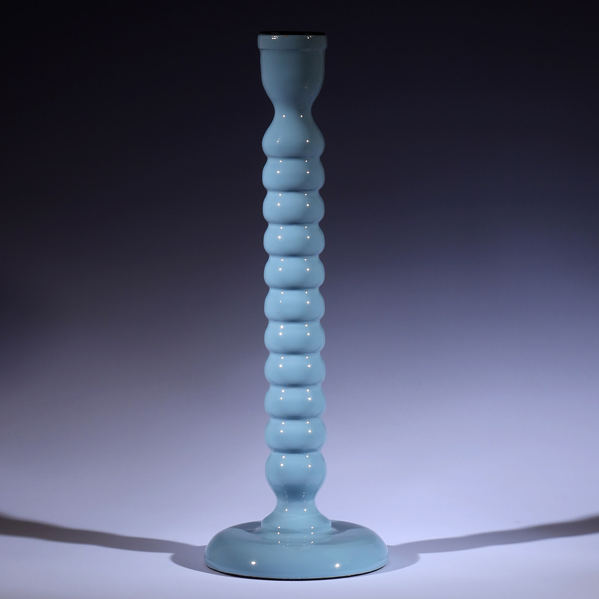 Powder Blue Polished Lacquer Candle holder,it is twisted all the way down like a corkscrew tapered at the bottom