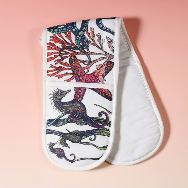 Reverse view of Cotton and linen mix oven gloves with hand drawn illustrations of coloured reef print of Jellyfish,seahorses,starfish and Octopus