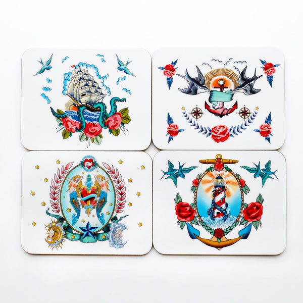 Product shot of set of 4 glossy melamine coaster each with a different brightly coloured design based on sailor's tattoos. There is a ship, kraken and roses design, a swallows and anchor, mermaids with a heart & dagger and a lighthouse with kraken and roses.