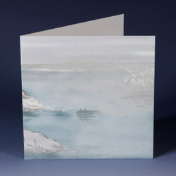 greeting card with illustration of a misty cove with smugglers rowing away from a sailboat