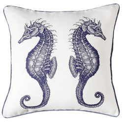 White piped linen cushion with navy chambray backing.On the front is a pair of seahorses facing away from each other in navy