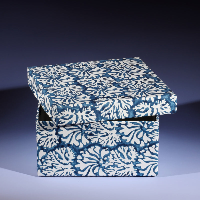 Small Coraline Prussia Blue hand blocked paper covered box with the lid askew