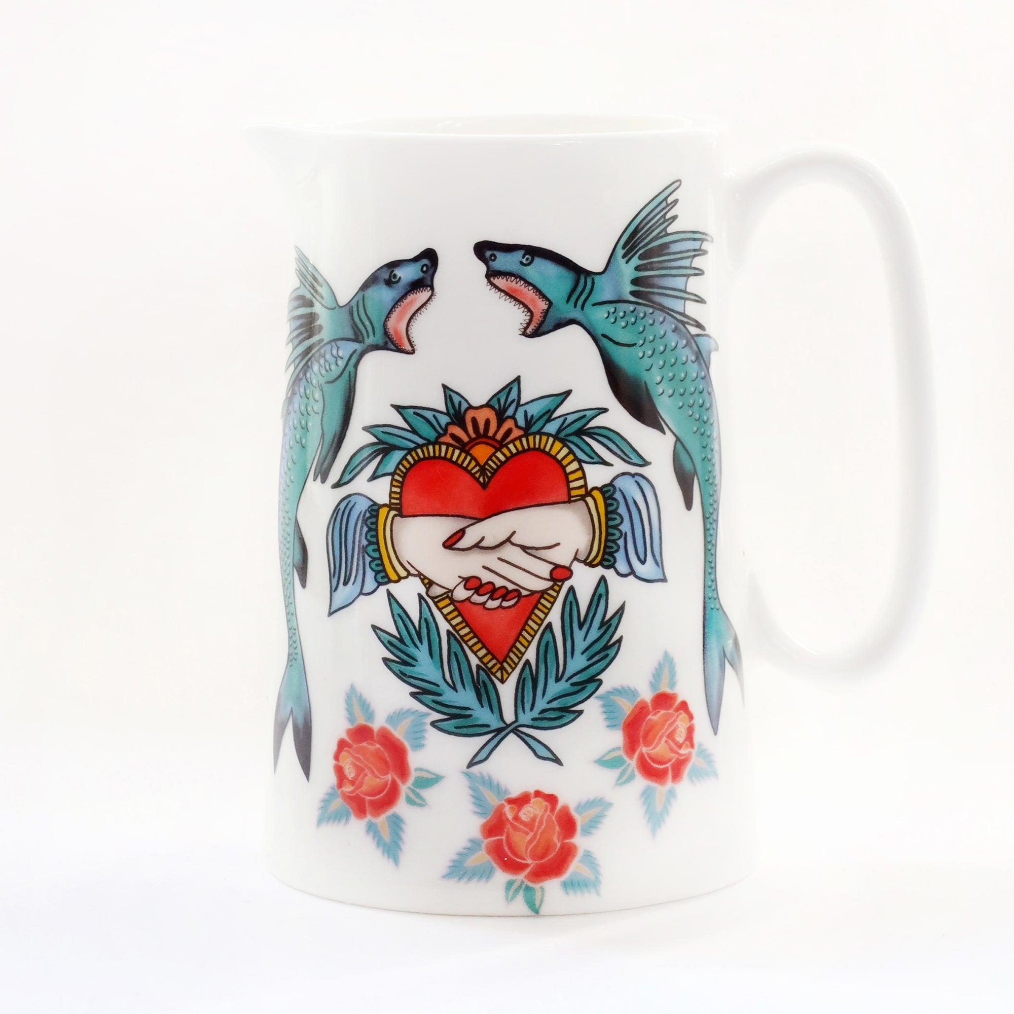 White bone china jug with brightly coloured tattoo inspired design of sharks and hearts.