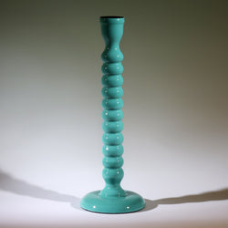 Turquoise Polished Lacquer Candle holder,it is twisted all the way down like a corkscrew tapered at the bottom.