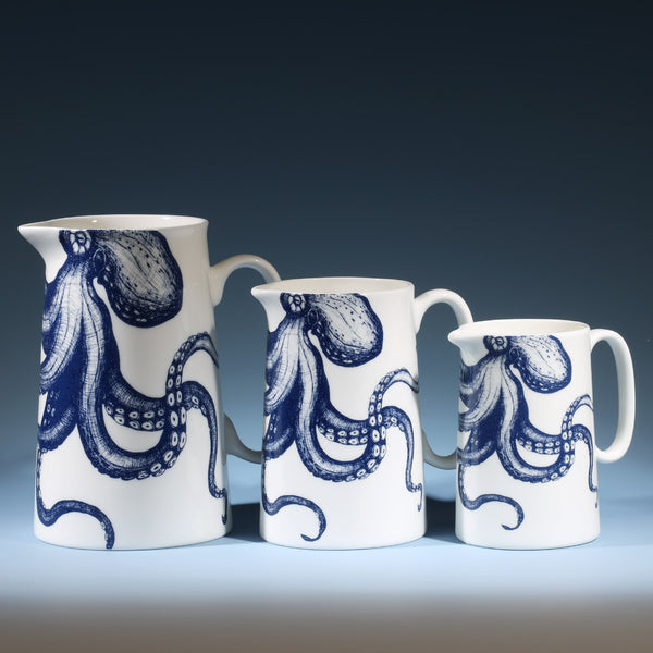 Three Bone China white Jugs with  hand drawn illustration of our Octopus in Navy.There are three sizes Large,Medium and the small