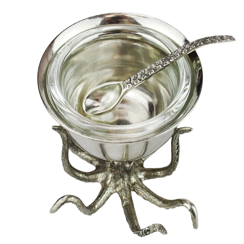 Close up of aerial view of the Pewter Octopus condiment bowl with the legs shaped as tentacles and a spoon shaped like a tentacle