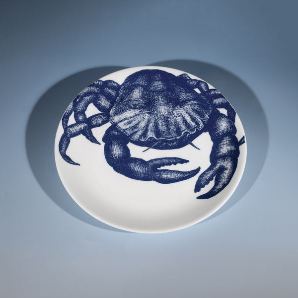 Bone China White plate with hand drawn illustrations of our Crab design on a side plate in Navy