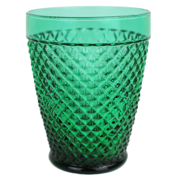 Close up of green diamond cut tumblers on a table