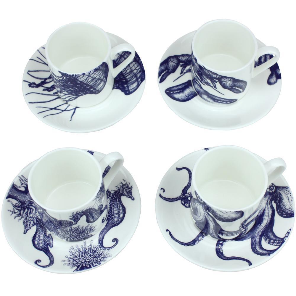 Four Bone China white espresso cups in hand drawn illustrations in our Octopus,Seahorse,Jellyfish and the Lobster designs in Navy with matching saucers.Saucers are arranged in a square with the cups on the saucers 