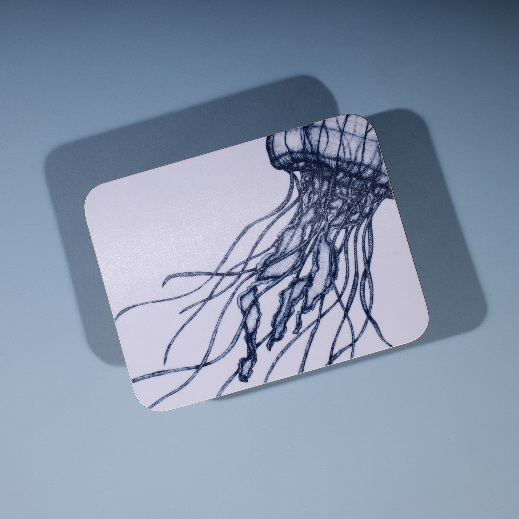 Jellyfish Design in Navy on a white Coaster
