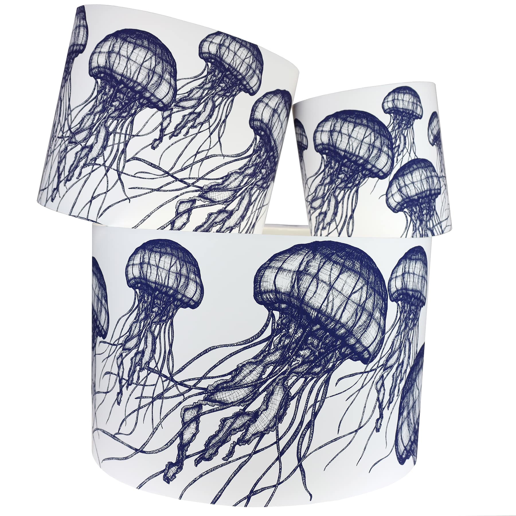 Our Classic Navy jellyfish design on a white background.The lampshades are shown in a stack of three showing all three sizes.