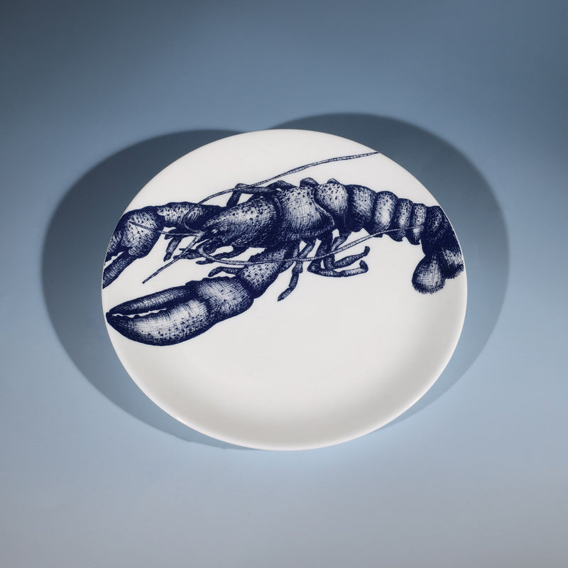 Bone China White plate with hand drawn illustrations of our Lobster design on a side plate in Navy
