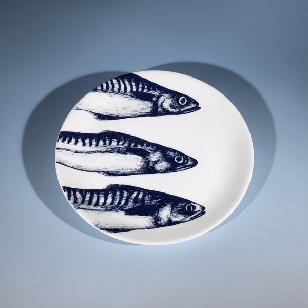 Bone China White plate with hand drawn illustrations of our Mackerel Head design on a side plate in Navy