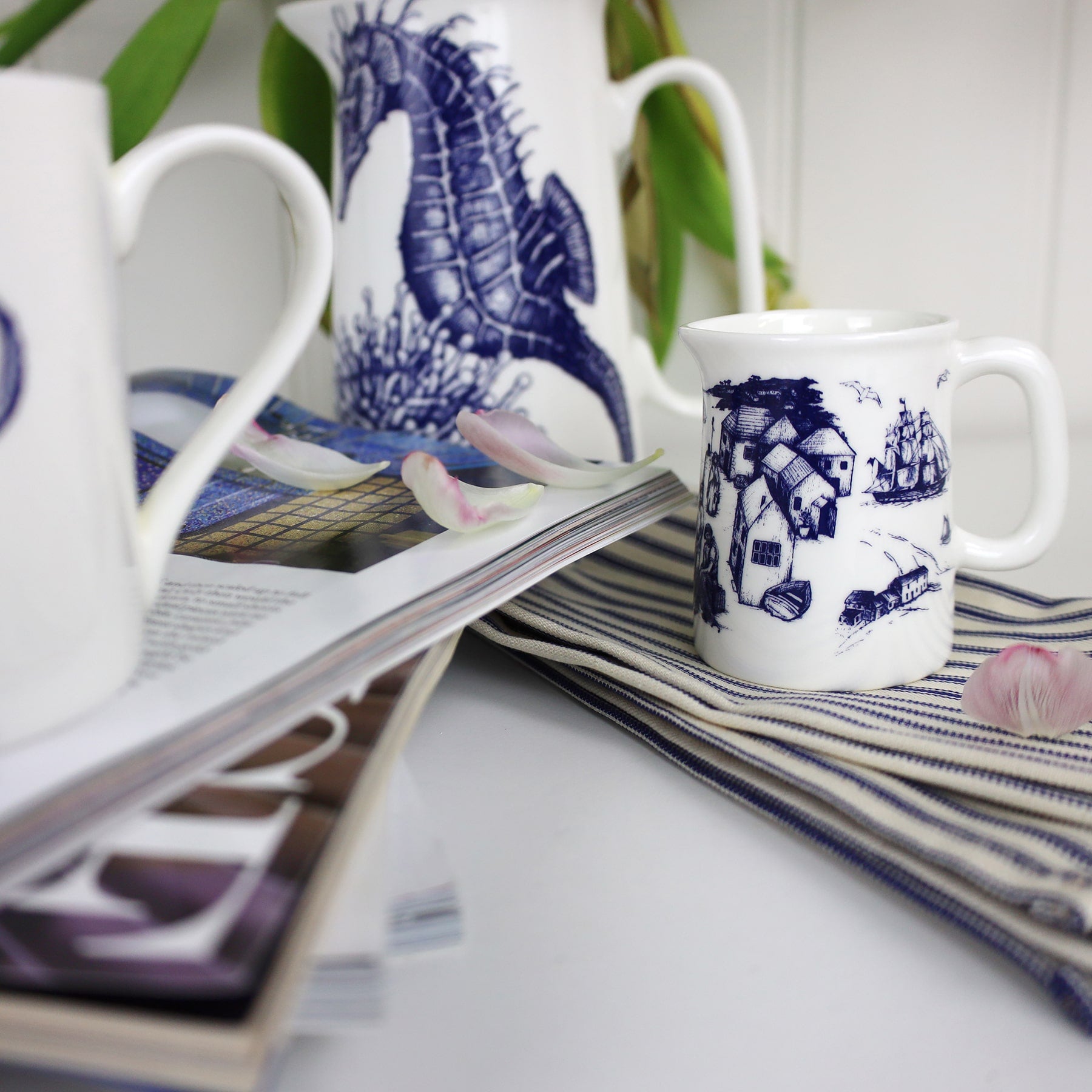 Lifestyle shot of bone china mini jug with boat harbour illustration -kitchen and dining-Cream Cornwall
