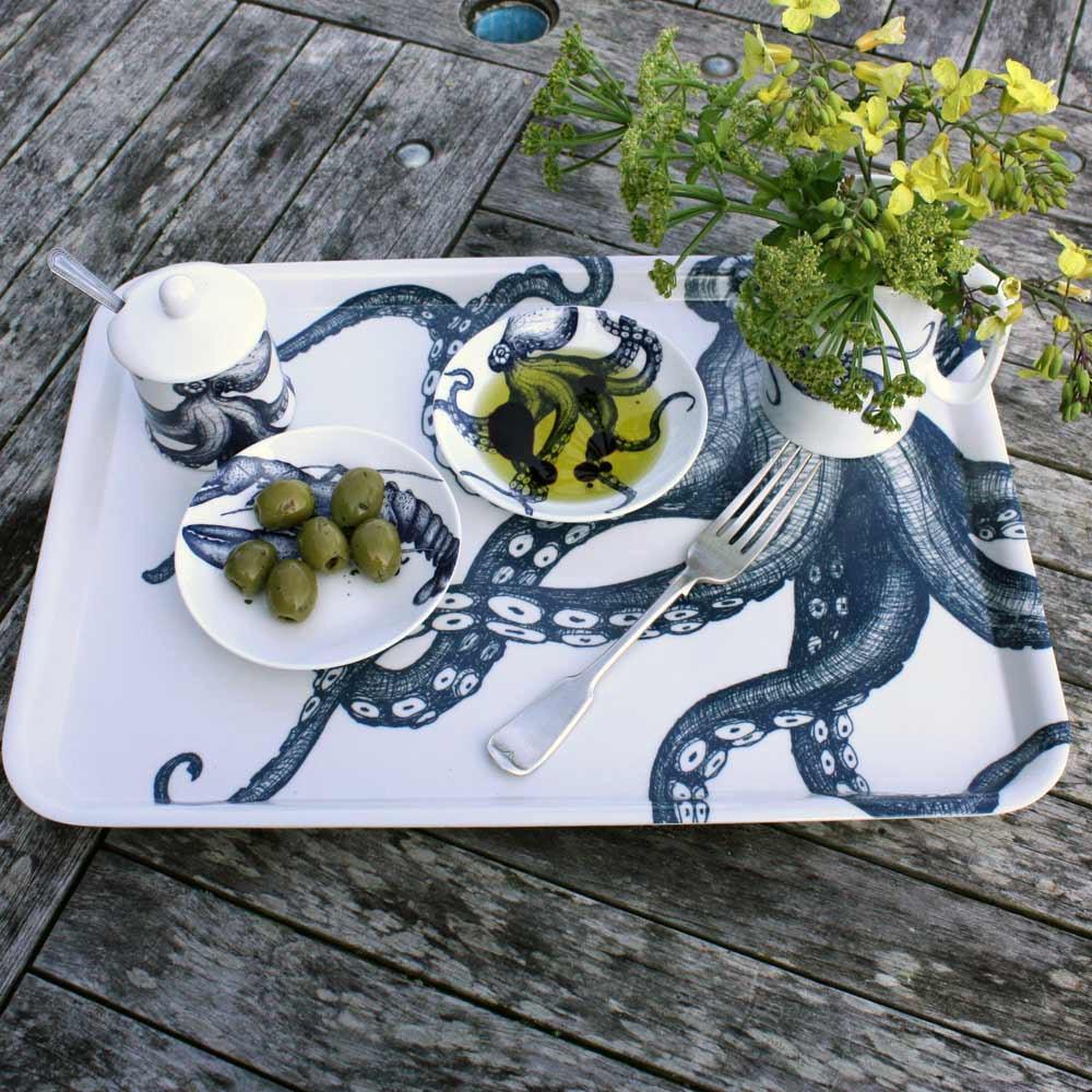 Nibbles bowl in Bone China in our Classic range in Navy and white in the Octopus design next to a lobster nibbles bowl with olives.All placed on an Octopus Tray with a matching jug and jampot