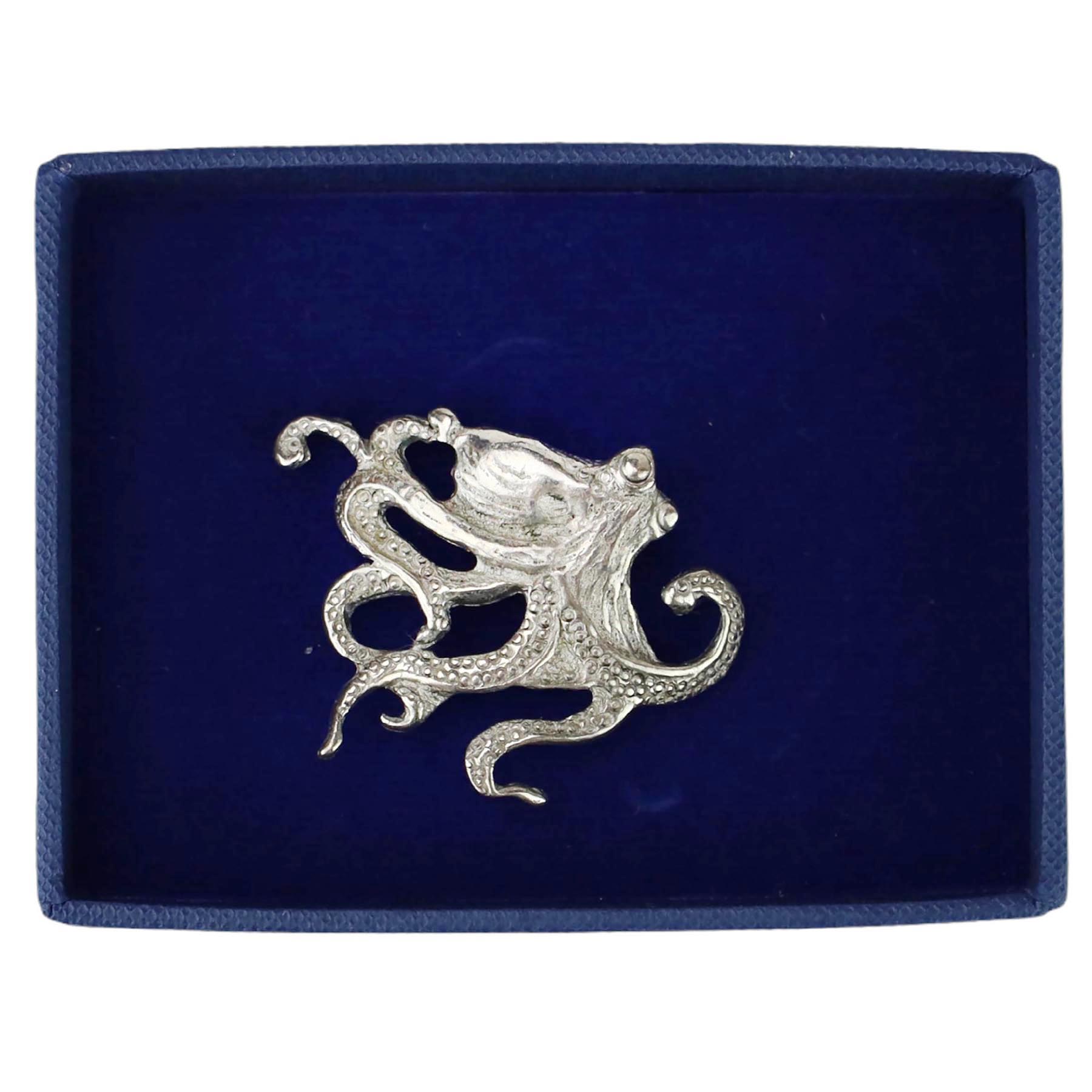 Pewter Octopus Candle Pin shown in the Navy box that it comes in