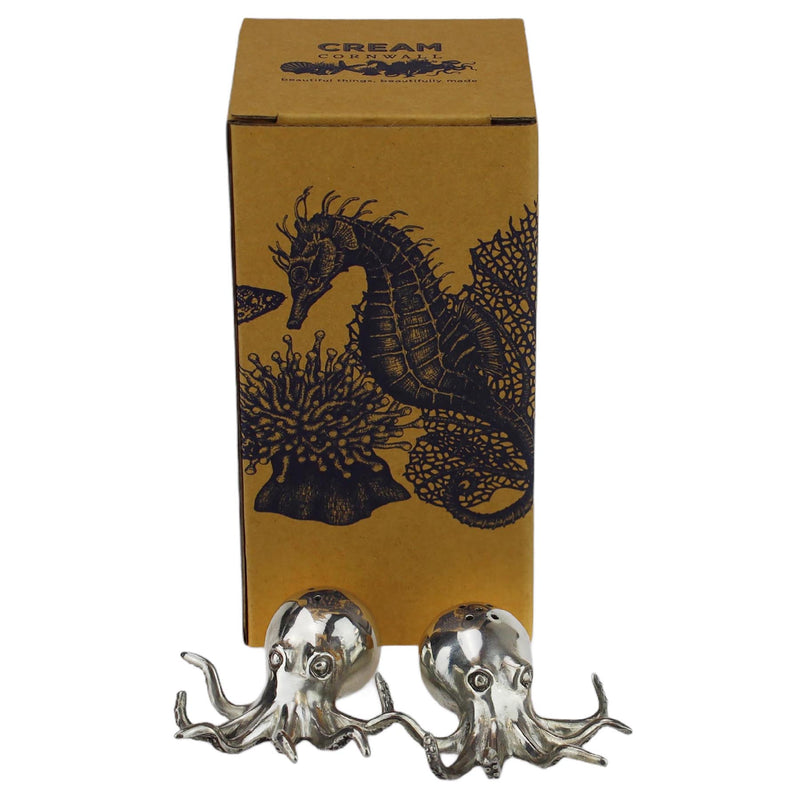 Pewter Octopus Salt and Pepper Shakers placed in front of a cream cornwall box
