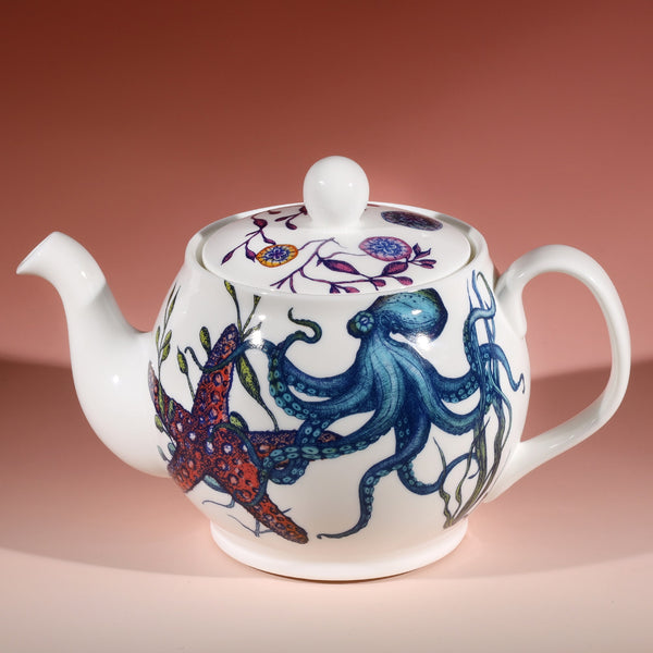 Close up Bone China Teapot with hand drawn design in our Reef range showing the blue octopus and Starfish amongst the seaweed