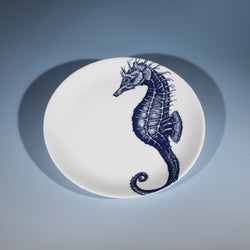 Bone China White plate with hand drawn illustrations of our Seahorse design on a side plate in Navy