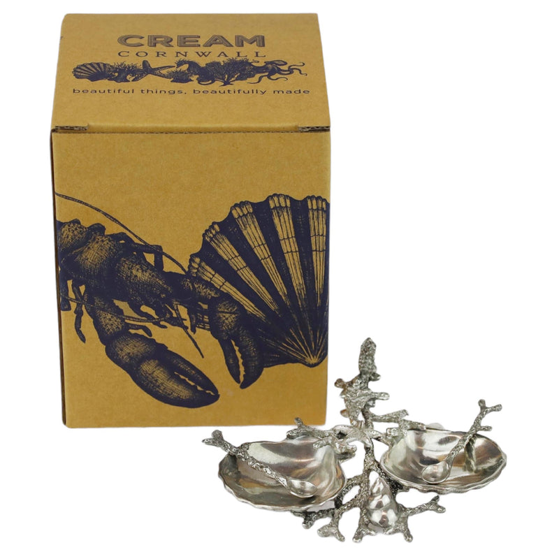 Pewter Shell & Coral Condiment Set consisting of two pewter bowls held together by a sea coral design pewter structure in front of a specially designed Cream Cornwall box 