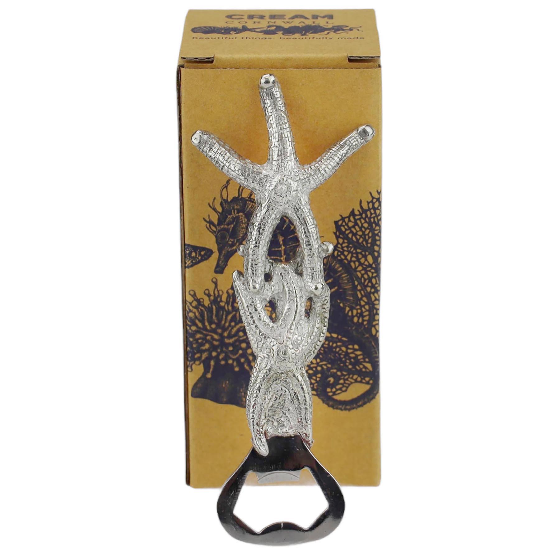 Pewter Starfish Bottle Opener in front of a cream cornwall box